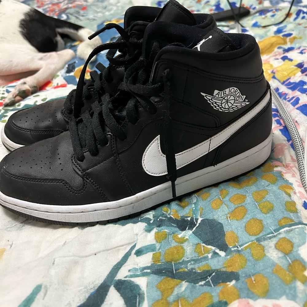 Air Jordan mids in black and white, women’s 11